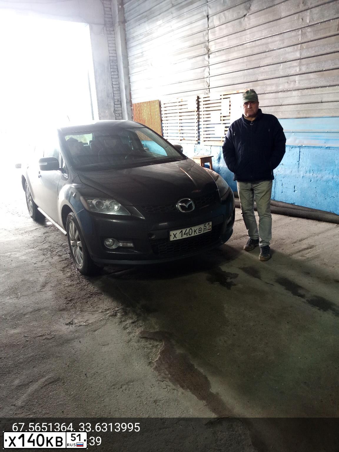 Фото автомобиля MAZDA CX-7, 2008 — госномер В749НЕ51. Цвет: ЧЕРНЫЙ