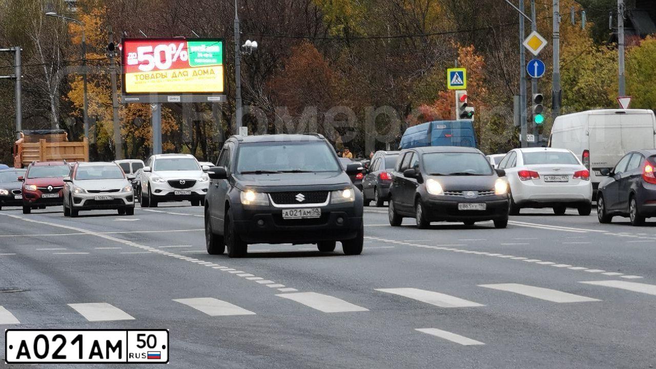 Фото автомобиля SUZUKI /GRAND/ VITARA, 2010 — госномер А021АМ50. Цвет: ЧЕРНЫЙ