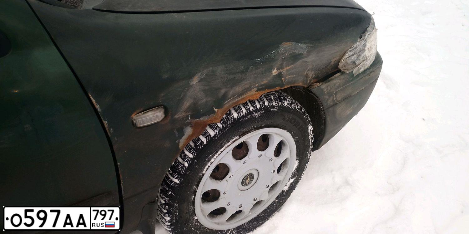 Фото автомобиля NISSAN PRIMERA, 1998 — госномер О597АА797. Цвет: ЗЕЛЕНЫЙ ТЕМНЫЙ