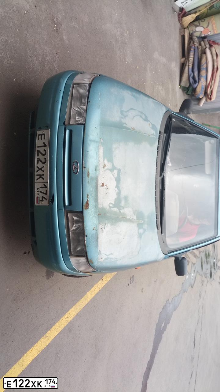 Фото автомобиля LADA 2110 LADA, 2000 — госномер Е122ХК174. Цвет: СЕРЕБРИСТЫЙ ЗЕЛЕНО-ГОЛУБОЙ