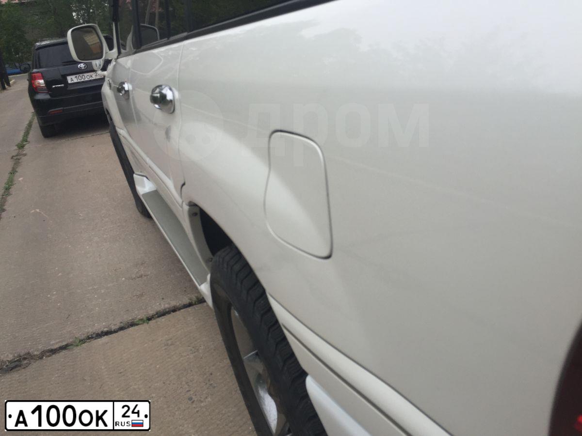 Фото автомобиля TOYOTA LANDCRUISER, 2002 — госномер А100ОК24. Цвет: Серый