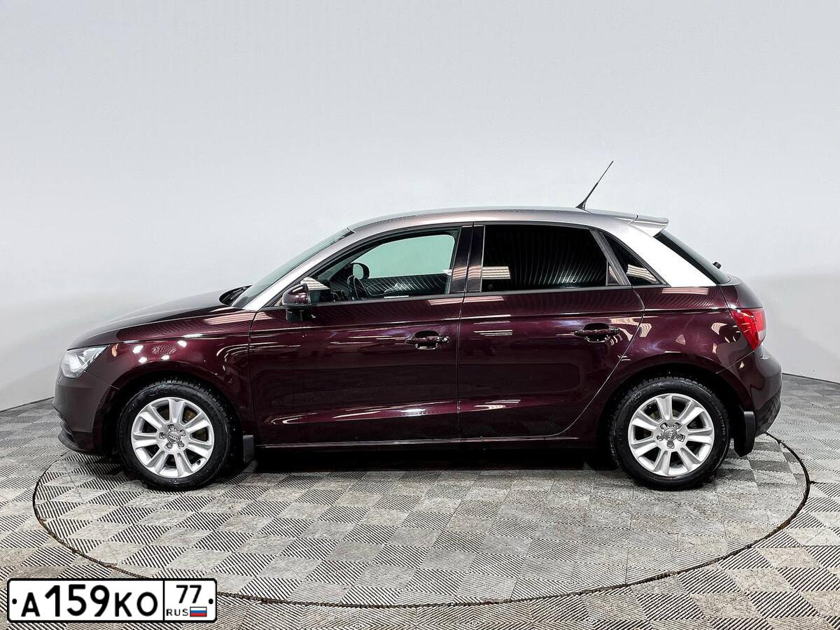 Фото автомобиля AUDI A1 SPORTBACK, 2012 — госномер К283ЕЕ977. Цвет: БОРДОВЫЙ