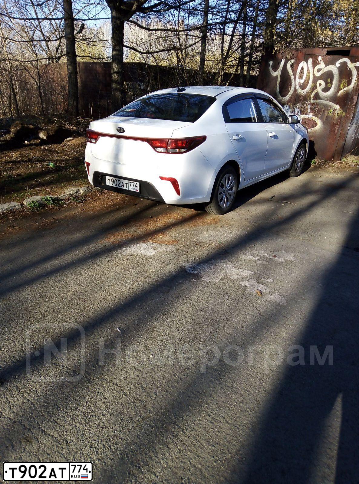 Фото автомобиля KIA RIO, 2020 — госномер Т902АТ774. Цвет: Белый