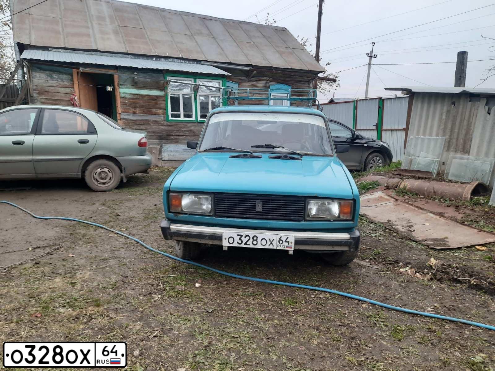 Фото автомобиля LADA 2104, 1995 — госномер О328ОХ64. Цвет: ГОЛУБОЙ