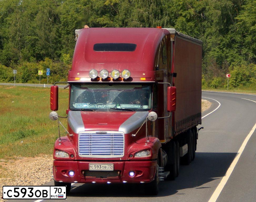 Фото автомобиля FREIGHTLINER CENTURY S/T, 2004 — госномер С593ОВ70. Цвет: Красный