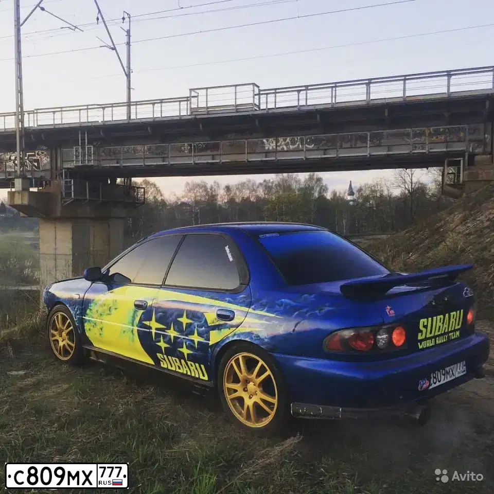 Фото автомобиля SUBARU IMPREZA, 1998 — госномер А918НР78. Цвет: СИНИЙ
