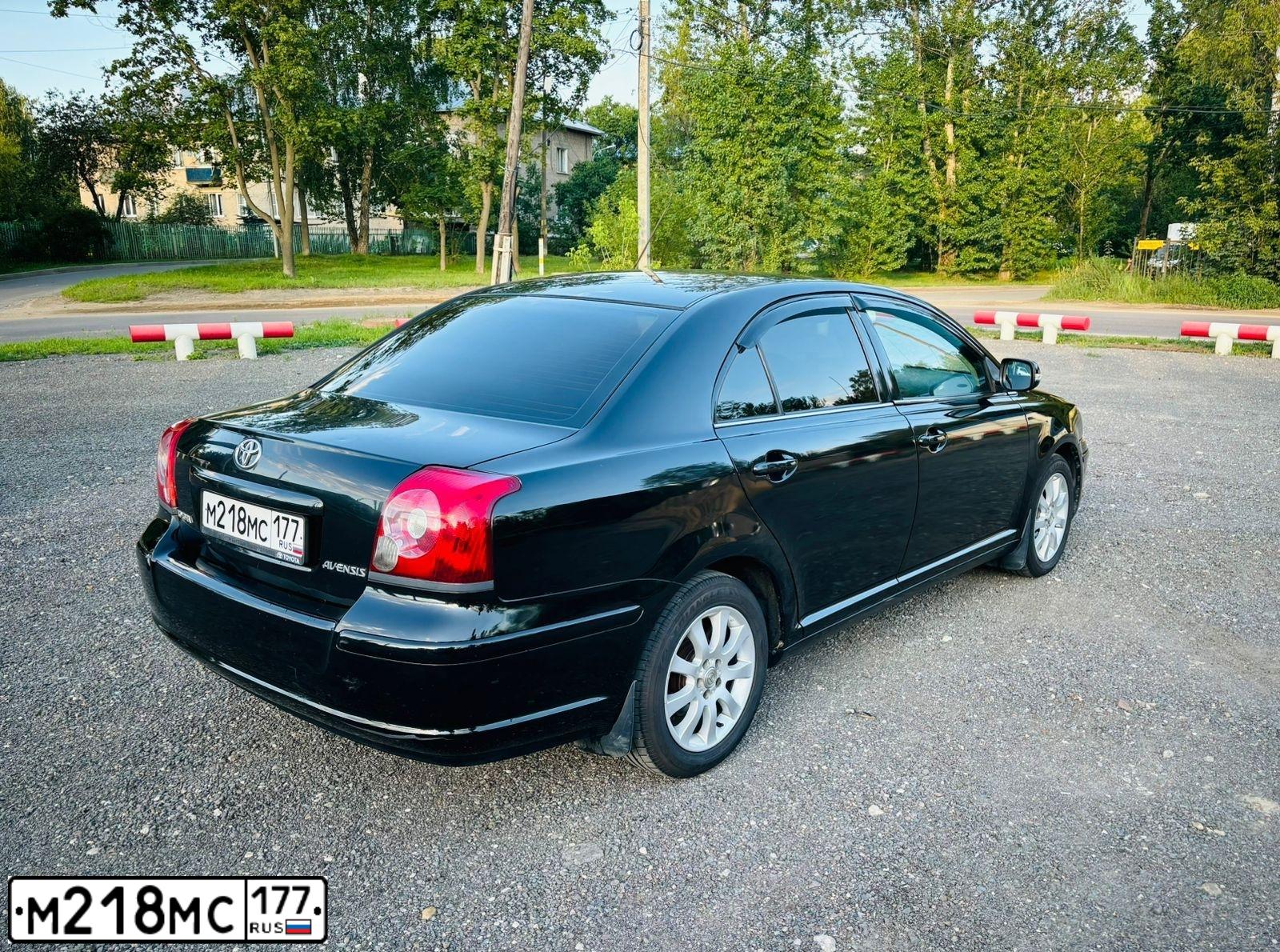 Фото автомобиля TOYOTA AVENSIS, 2006 — госномер М218МС177. Цвет: ЧЕРНЫЙ