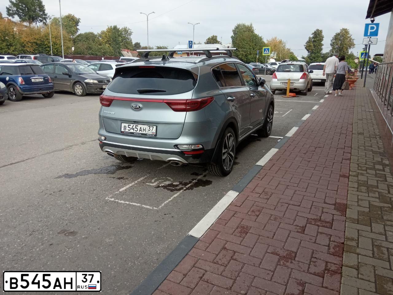 Фото автомобиля KIA SPORTAGE, 2012 — госномер В545АН37. Цвет: СЕРЫЙ