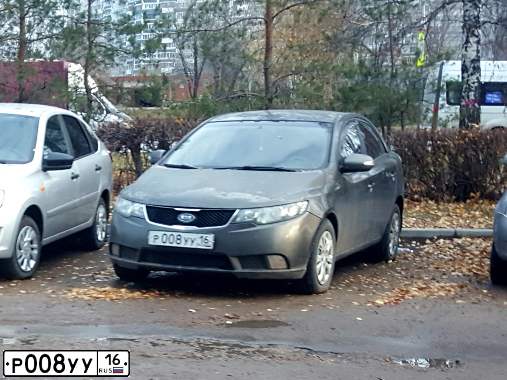 Фото автомобиля KIA CERATO, 2009 — госномер Р008УУ16. Цвет: бронзовый