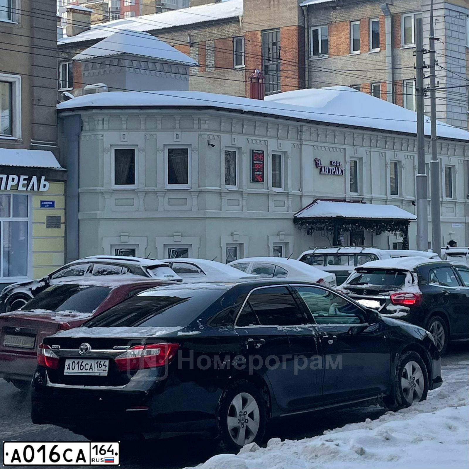 Фото автомобиля TOYOTA CAMRY, 2013 — госномер А016СА164. Цвет: ЧЕРНЫЙ МЕТАЛЛИК