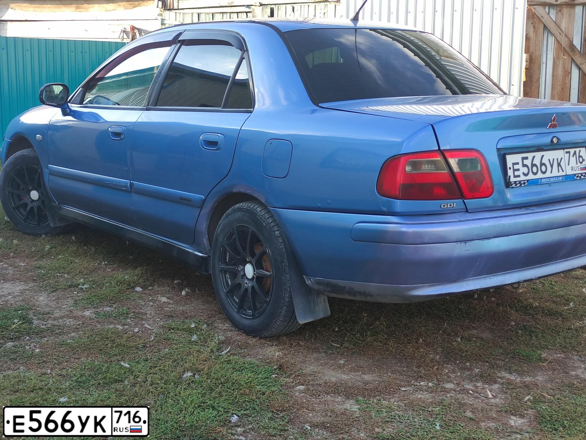 Фото автомобиля MITSUBISHI CARISMA, 2000 — госномер Е566УК716. Цвет: ГОЛУБОЙ ПЕРЛАМУТРОВЫЙ