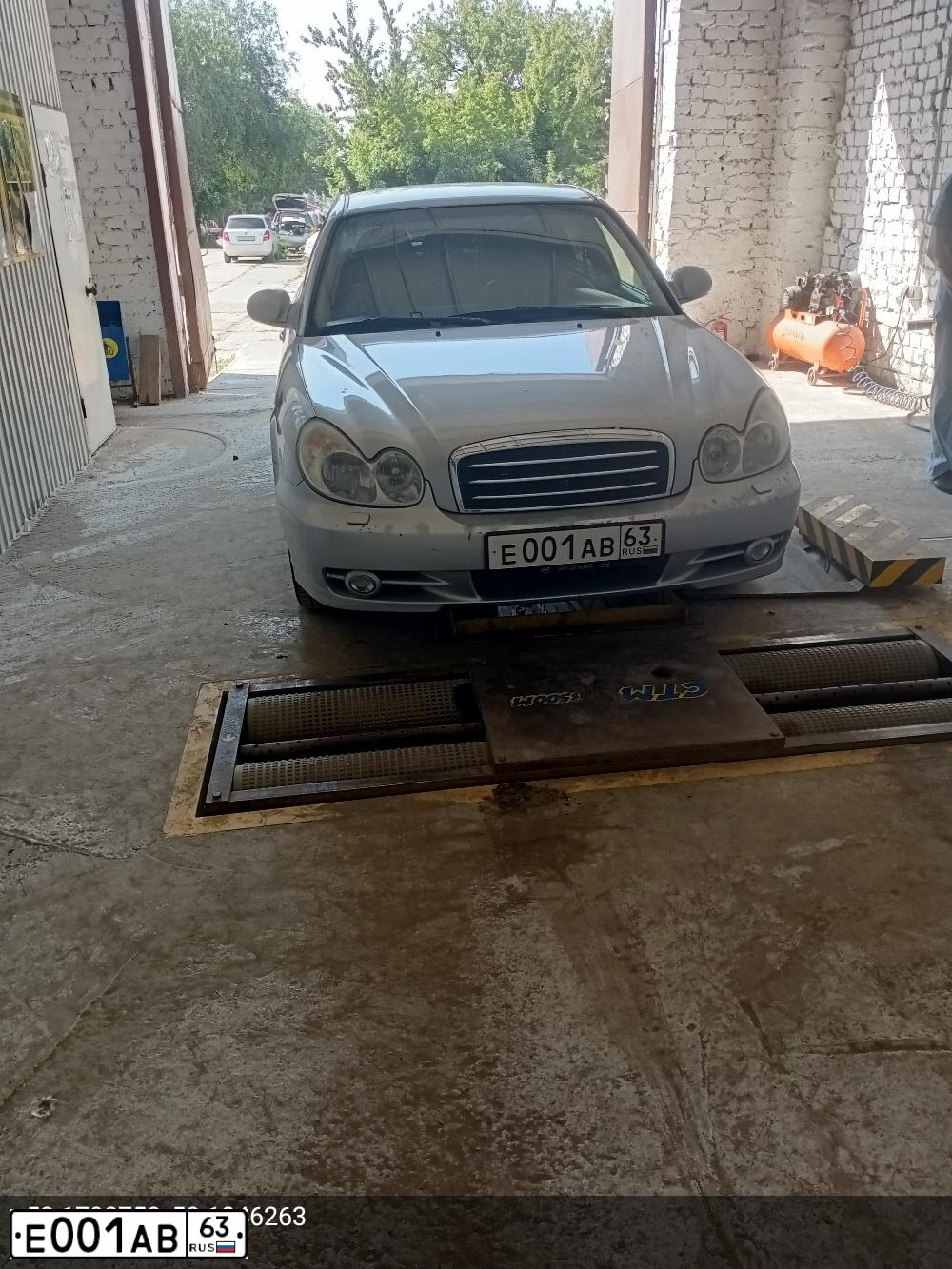 Фото автомобиля TAGAZ SONATA, 2006 — госномер Е001АВ63. Цвет: СЕРЕБРИСТЫЙ
