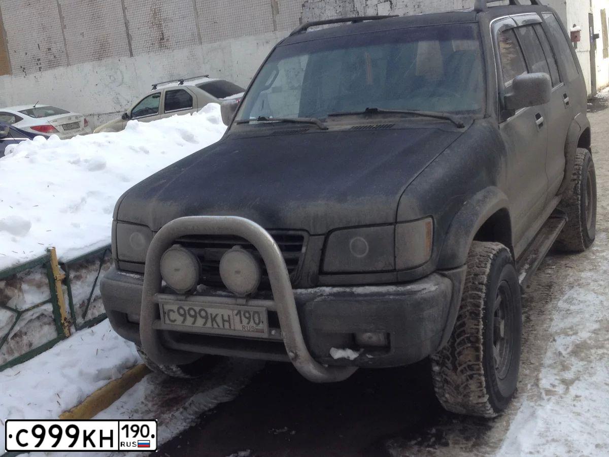 Фото автомобиля ISUZU VEHICROSS, 2000 — госномер С999КН190. Цвет: ЧЕРНЫЙ