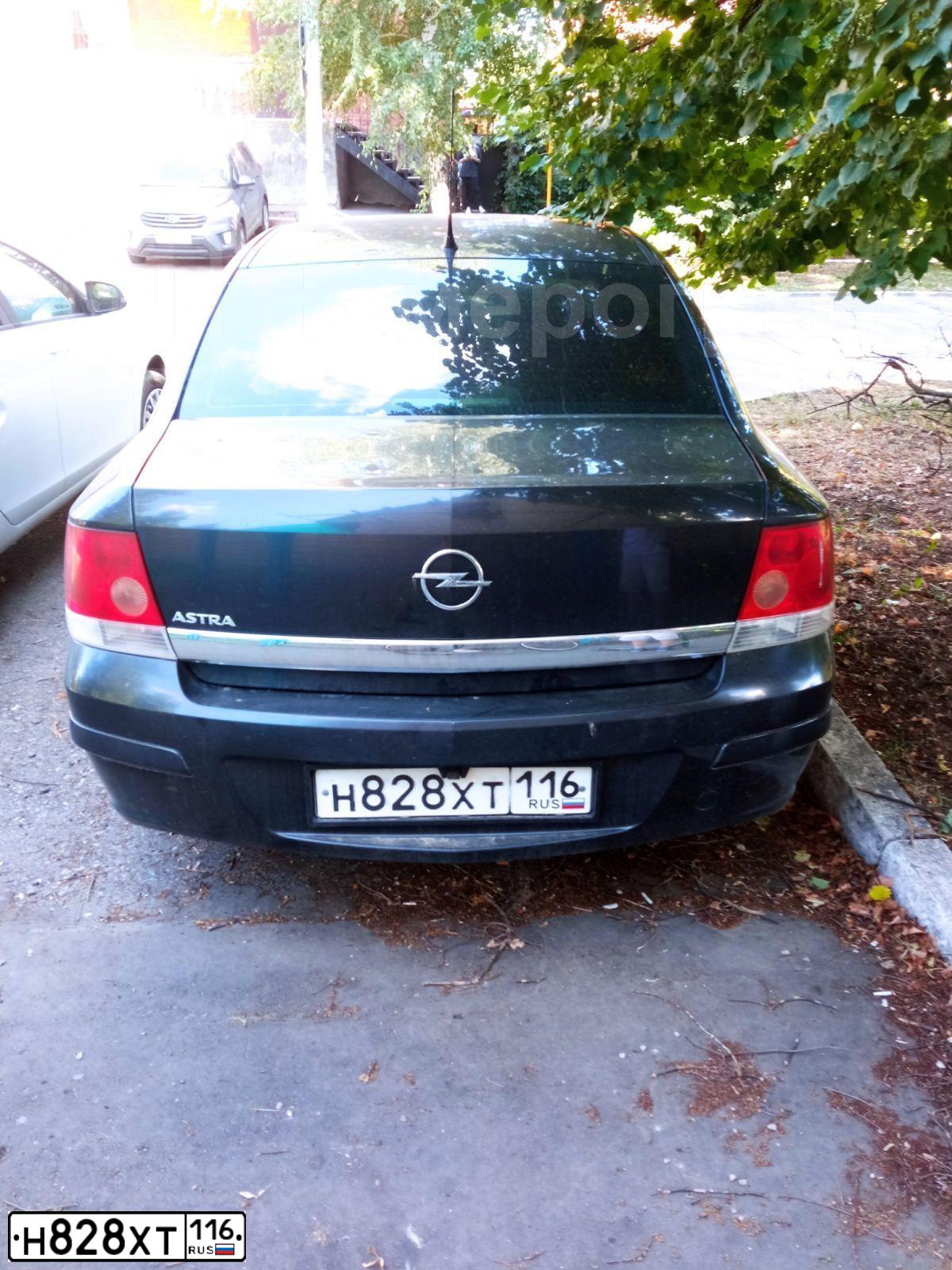 Фото автомобиля OPEL ASTRA, 2011 — госномер Н828ХТ116. Цвет: ЧЕРНЫЙ