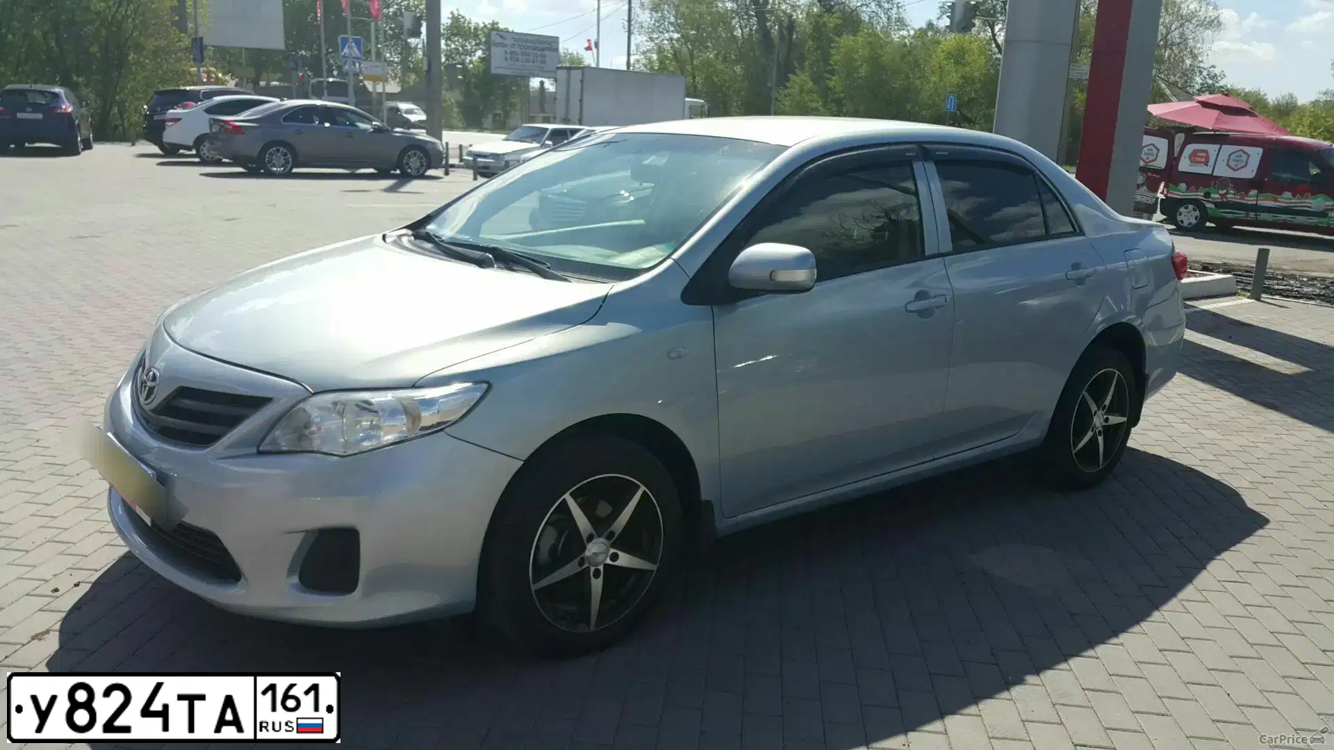 Фото автомобиля TOYOTA COROLLA, 2011 — госномер У824ТА161. Цвет: ГОЛУБОЙ СВЕТЛЫЙ