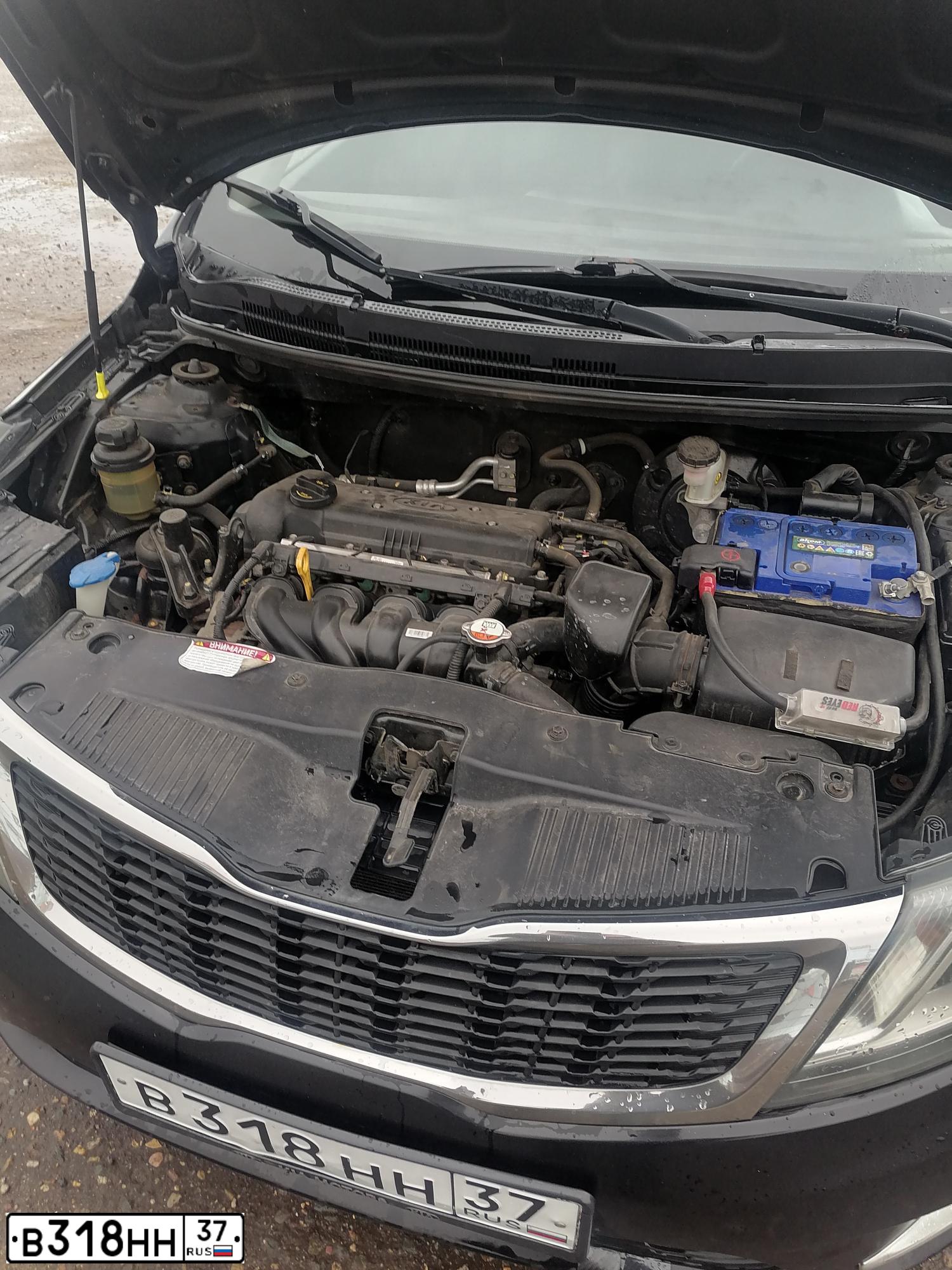 Фото автомобиля KIA RIO, 2014 — госномер В318НН37. Цвет: ЧЕРНЫЙ