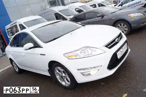 Фото автомобиля FORD MONDEO, 2011 — госномер К995ЕА126. Цвет: Белый
