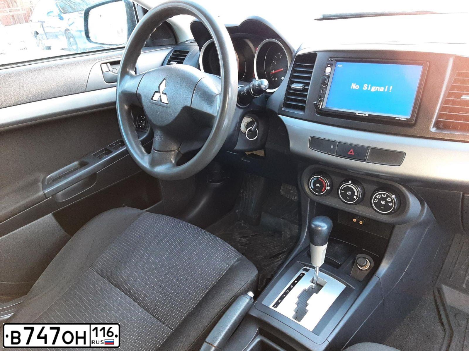 Фото автомобиля MITSUBISHI LANCER, 2010 — госномер К478УТ702. Цвет: ЧЕРНЫЙ