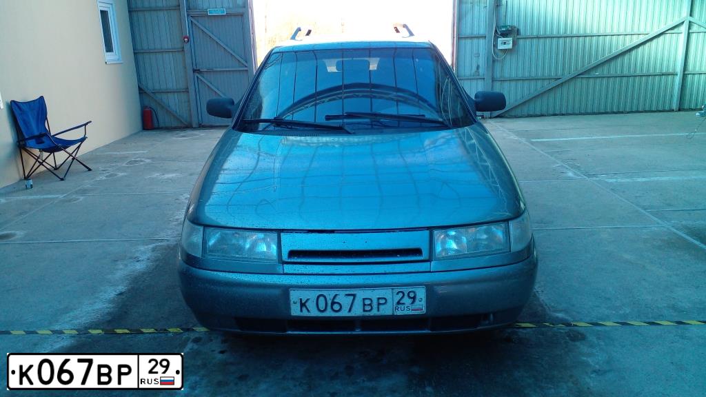 Фото автомобиля LADA 2111, 2006 — госномер Е112ХН29. Цвет: СЕРО-ЗЕЛЕНЫЙ