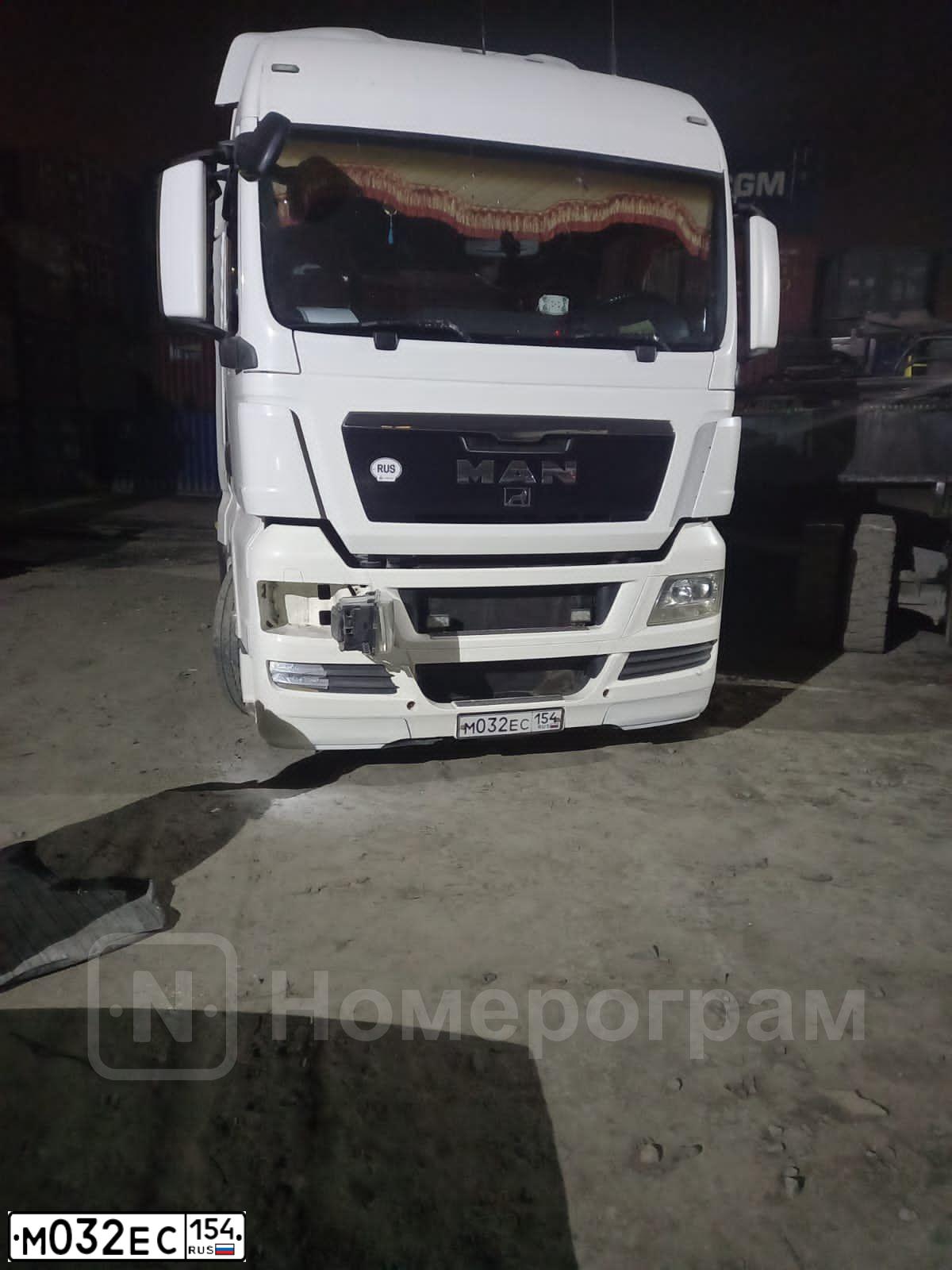 Фото автомобиля MAN TGX 18.XXX /4X2/, 2012 — госномер М032ЕС154. Цвет: Белый