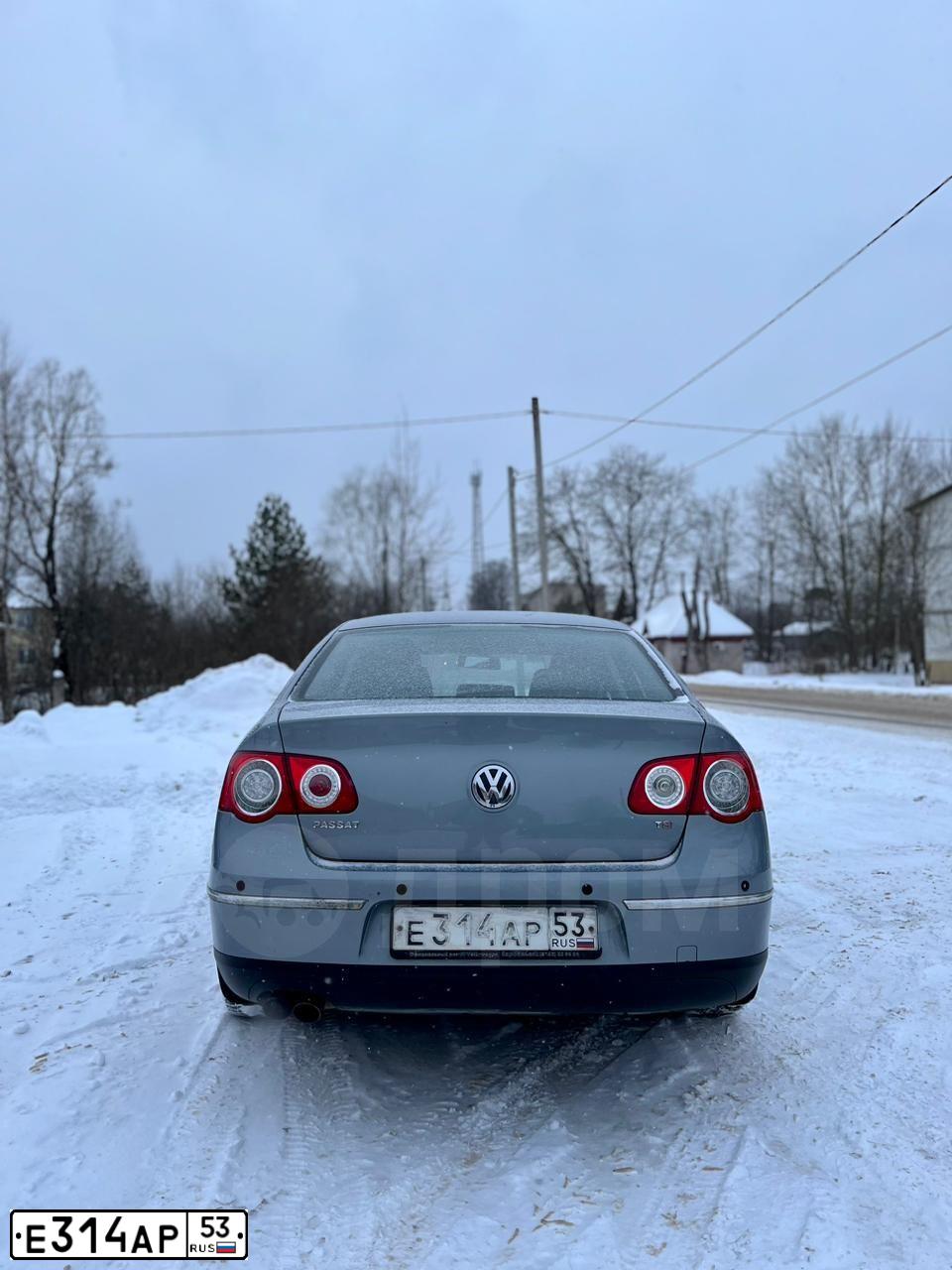 Фото автомобиля VOLKSWAGEN PASSAT, 2010 — госномер К393СО53. Цвет: СЕРО-ГОЛУБОЙ