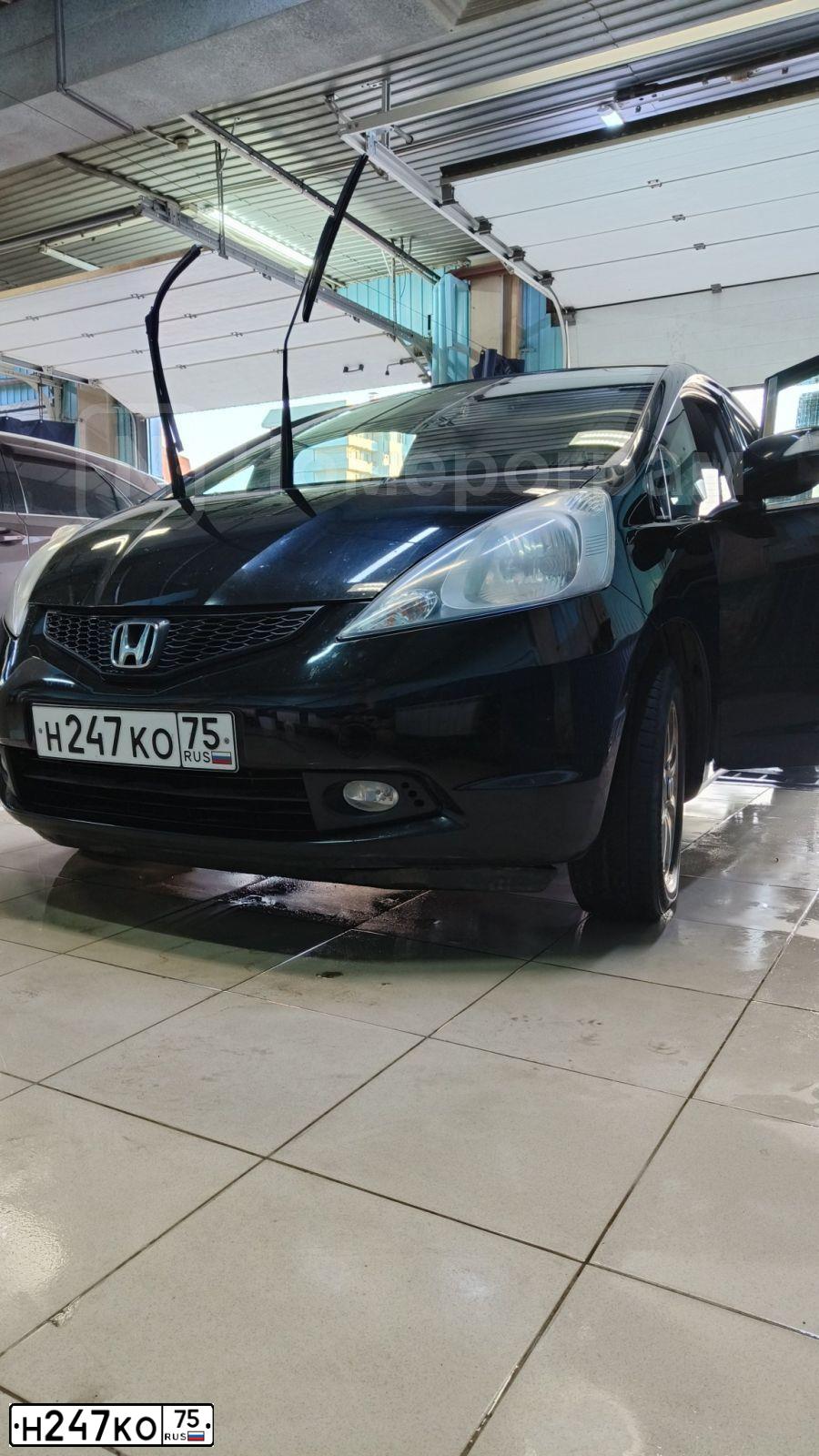 Фото автомобиля HONDA FIT, 2009 — госномер Н217ТС124