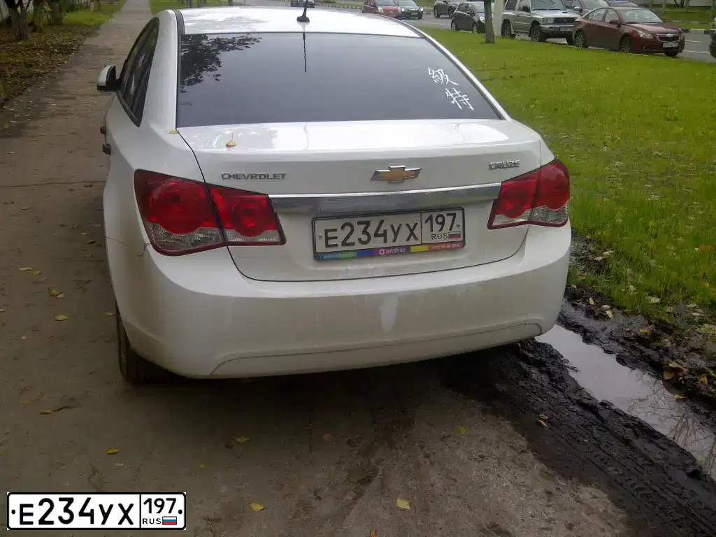 Фото автомобиля CHEVROLET CRUZE, 2012 — госномер Е234УХ197. Цвет: БЕЛЫЙ
