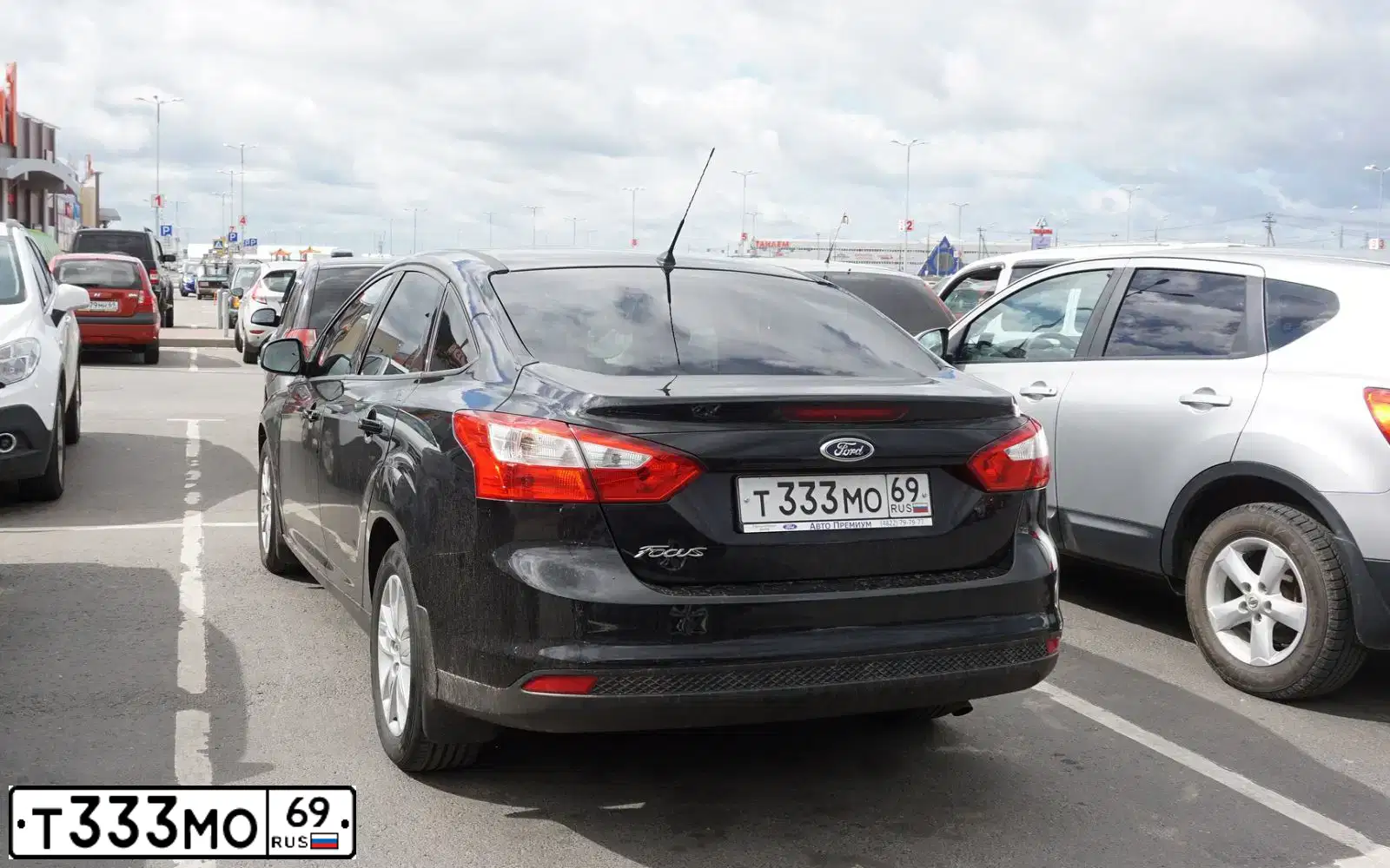 Фото автомобиля FORD FOCUS, 2012 — госномер О202ОО69. Цвет: ЧЕРНЫЙ