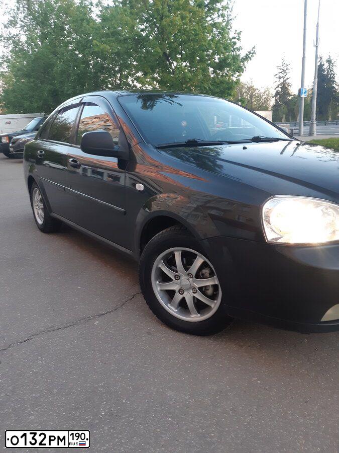 Фото автомобиля CHEVROLET LACETTI, 2011 — госномер Н275ТУ62. Цвет: ЧЕРНЫЙ