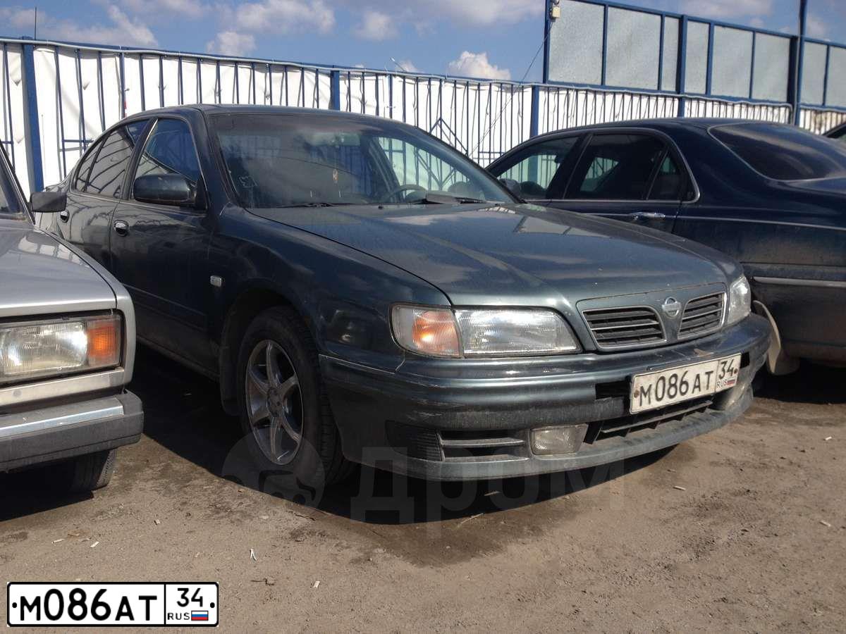 Фото автомобиля NISSAN MAXIMA, 1999 — госномер В136РН134. Цвет: ЗЕЛЕНЫЙ