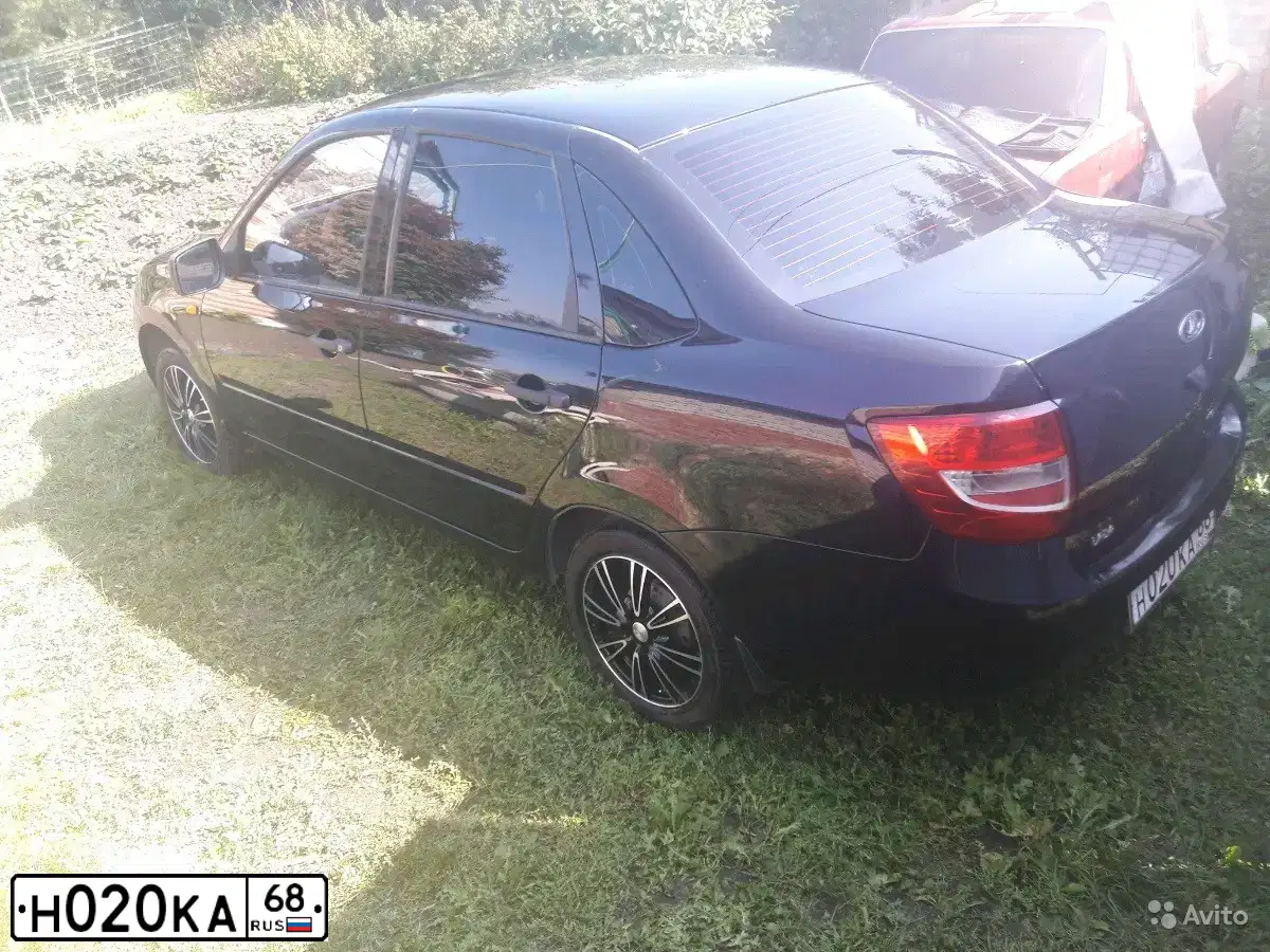 Фото автомобиля LADA 2190 GRANTA, 2013 — госномер Н020КА68. Цвет: ЧЕРНЫЙ
