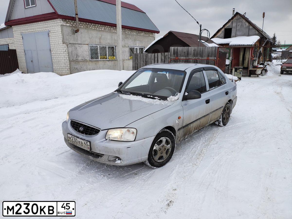 Фото автомобиля TAGAZ ACCENT, 2005 — госномер М230КВ45. Цвет: Серебристый