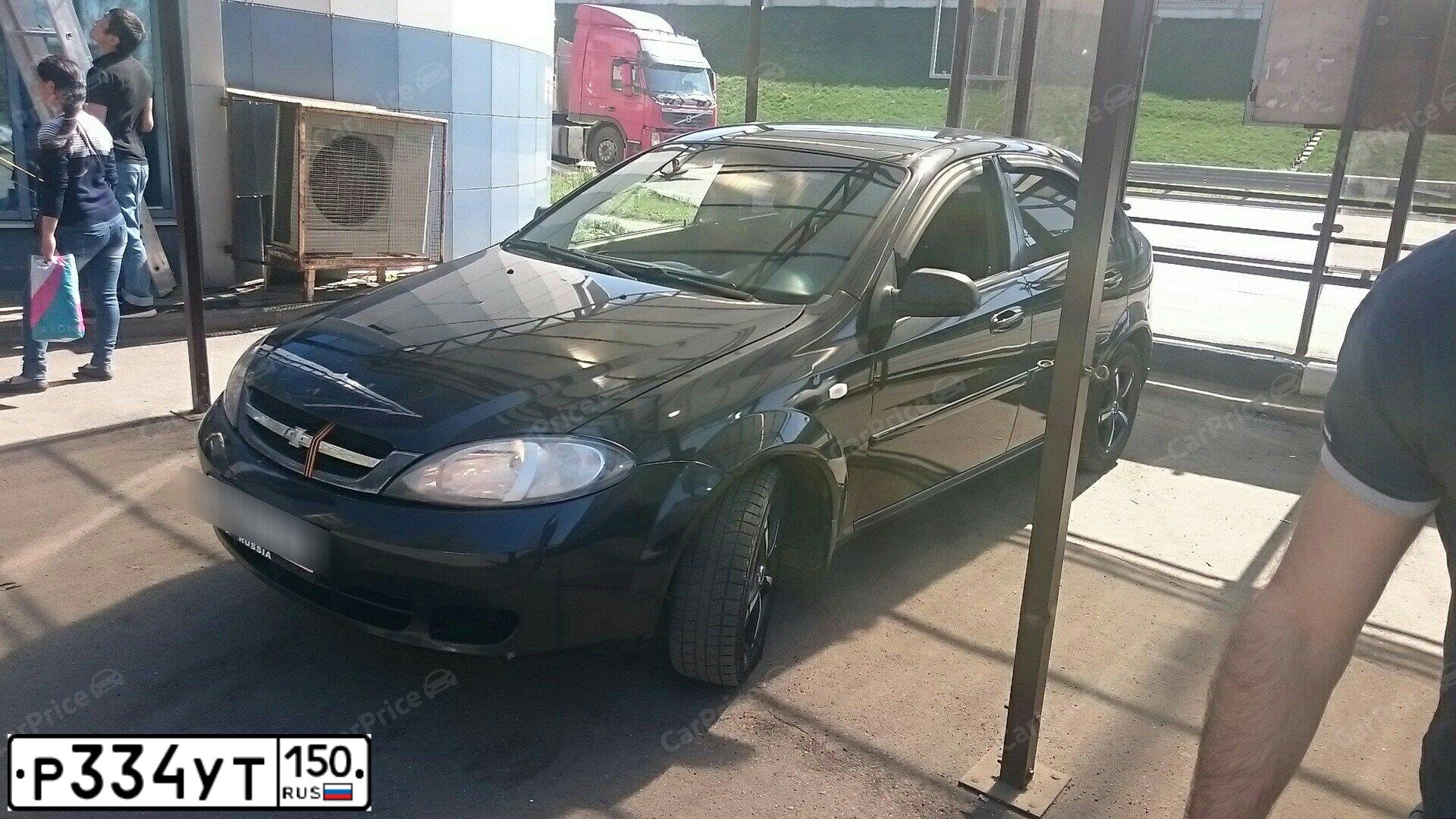 Фото автомобиля CHEVROLET LACETTI, 2008 — госномер В030ВХ76. Цвет: ЧЕРНЫЙ