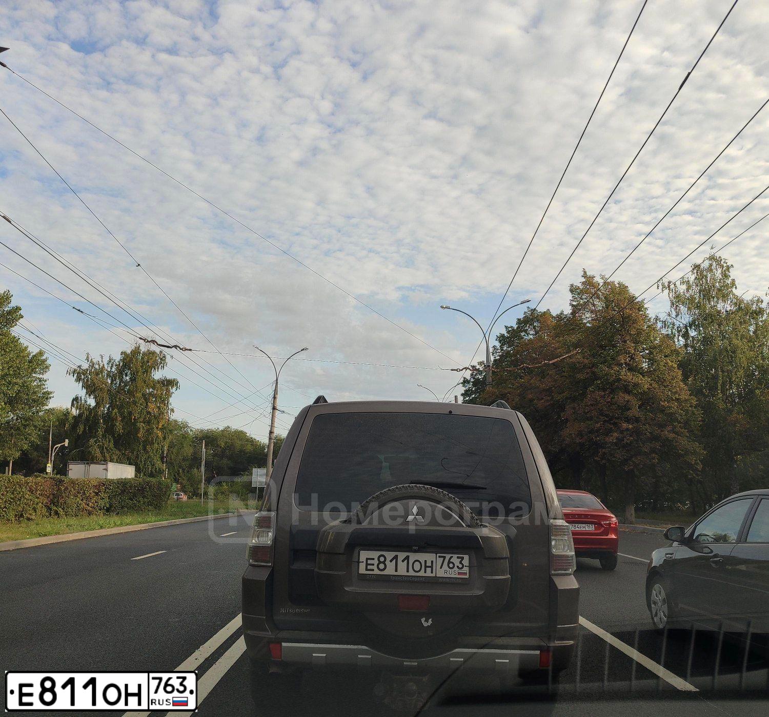 Фото автомобиля MITSUBISHI PAJERO, 2010 — госномер Е811ОН763. Цвет: Коричневый