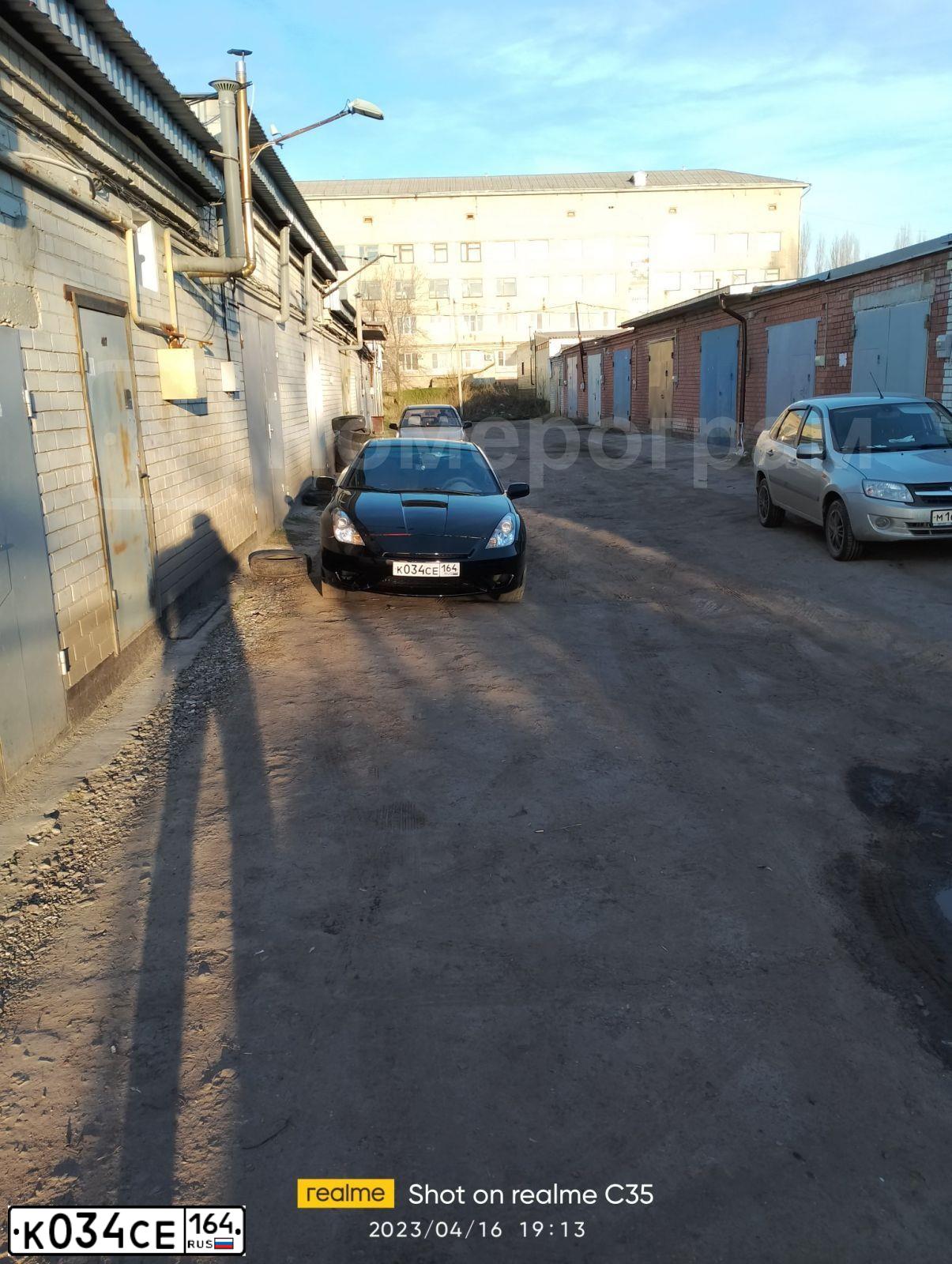 Фото автомобиля TOYOTA CELICA, 2000 — госномер К034СЕ164. Цвет: ЧЕРНЫЙ