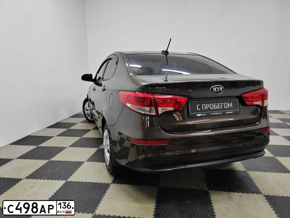 Фото автомобиля KIA RIO, 2017 — госномер С498АР136. Цвет: КОРИЧНЕВЫЙ
