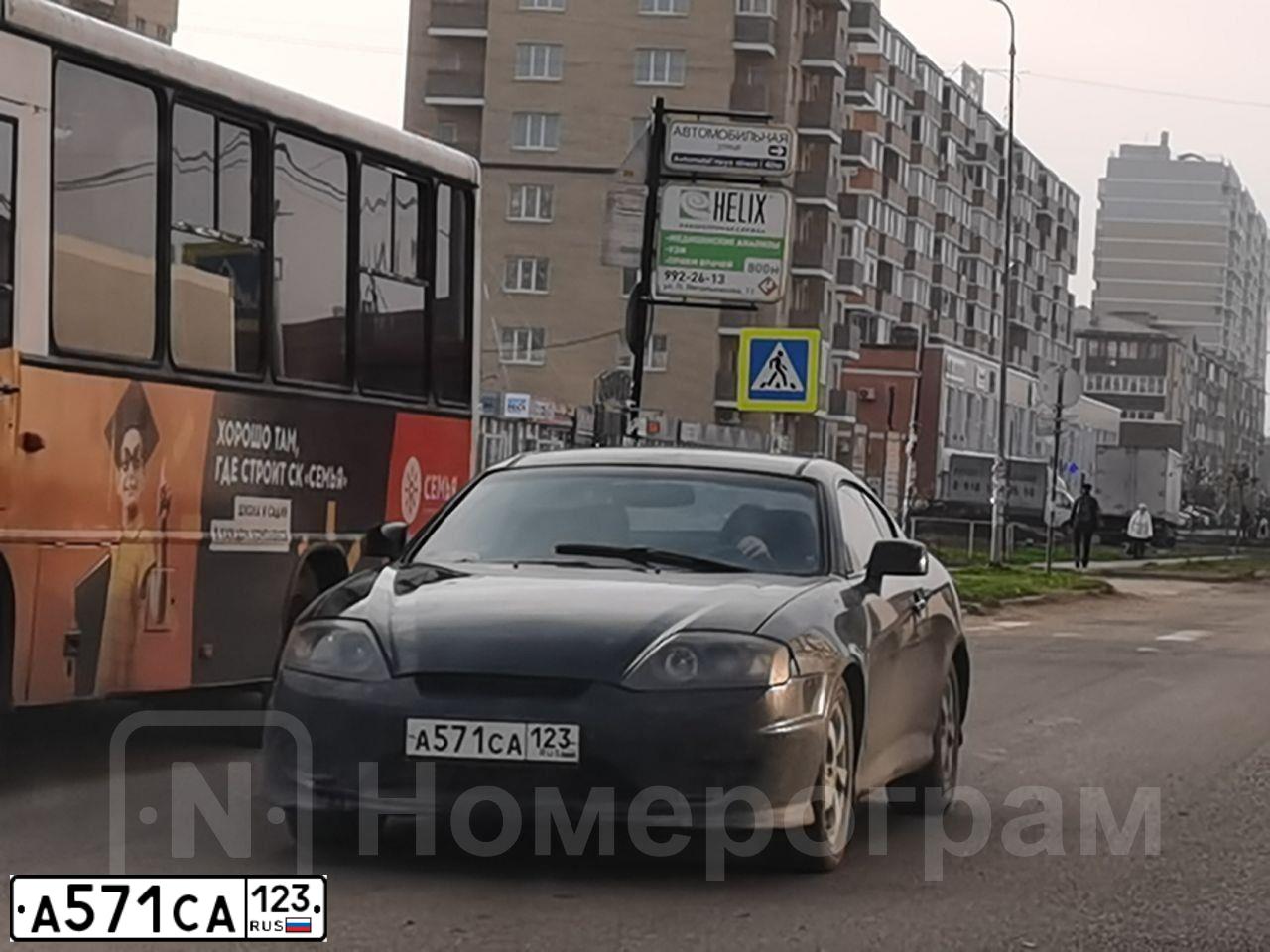 Фото автомобиля HYUNDAI TIBURON, 2005 — госномер А571СА123. Цвет: ЧЕРНЫЙ