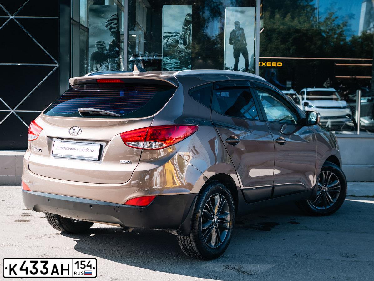 Фото автомобиля HYUNDAI IX35, 2013 — госномер К433АН154. Цвет: БРОНЗОВЫЙ