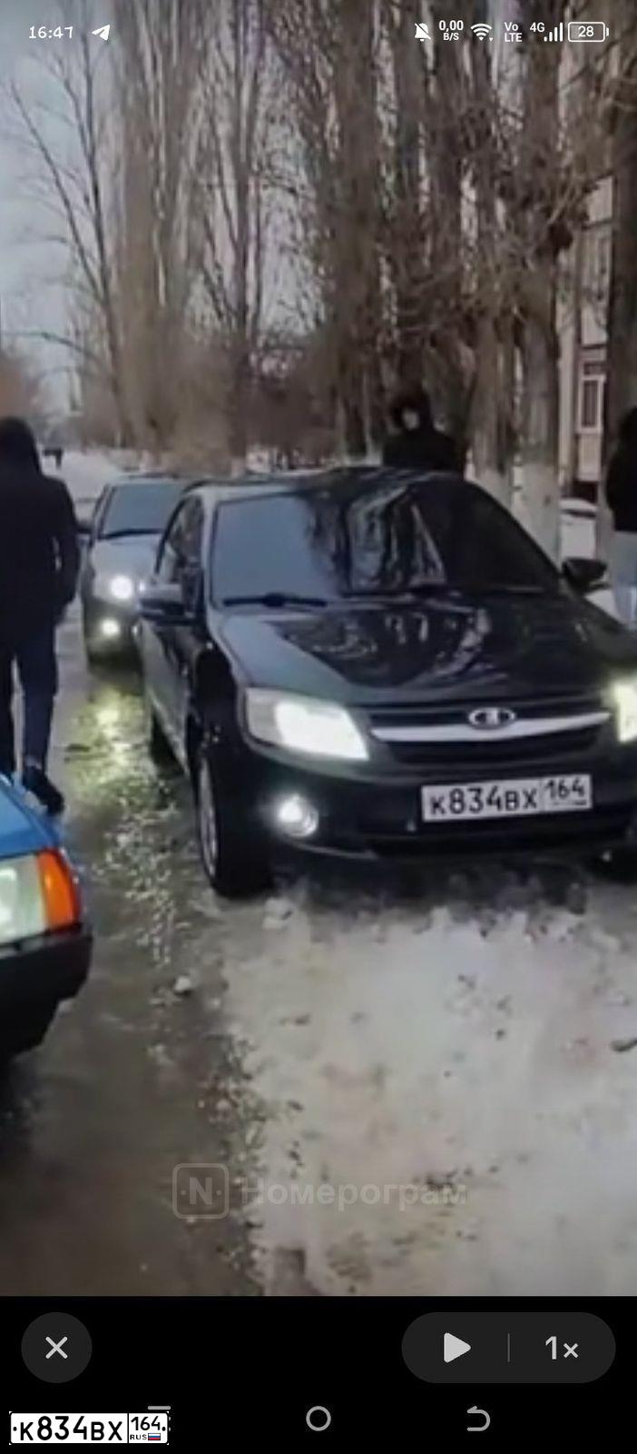 Фото автомобиля LADA 2190 GRANTA, 2013 — госномер К834ВХ164. Цвет: Сине-Черный