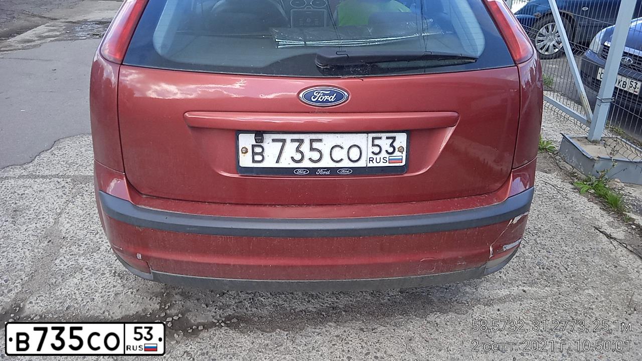 Фото автомобиля FORD D FOCUS, 2007 — госномер В735СО53. Цвет: КРАСНО-ОРАНЖЕВЫЙ