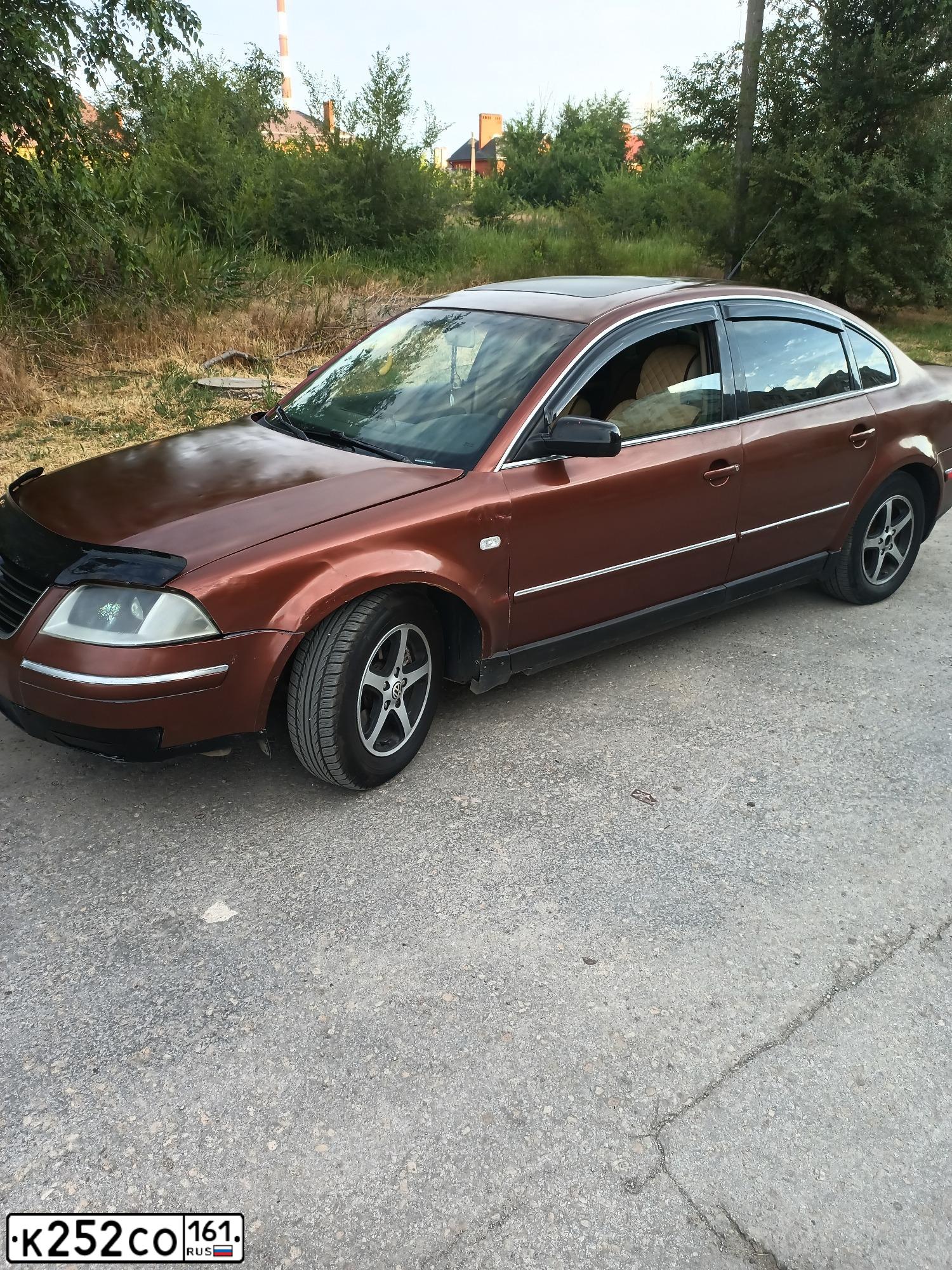 Фото автомобиля VOLKSWAGEN PASSAT, 2003 — госномер К252СО161. Цвет: БОРДОВЫЙ