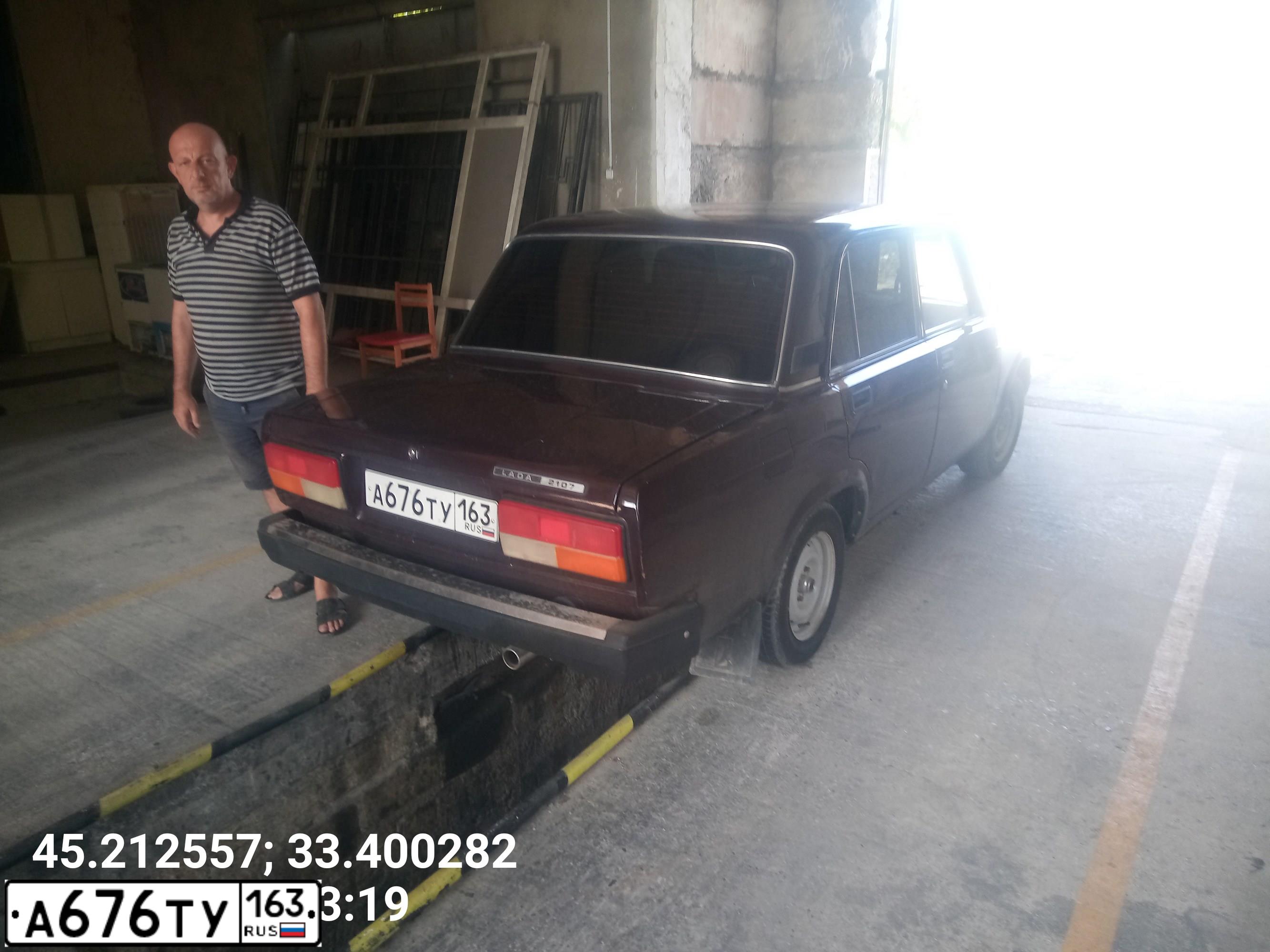 Фото автомобиля LADA 2107, 2009 — госномер Р405АС82. Цвет: ТЕМНО-КОРИЧНЕВЫЙ