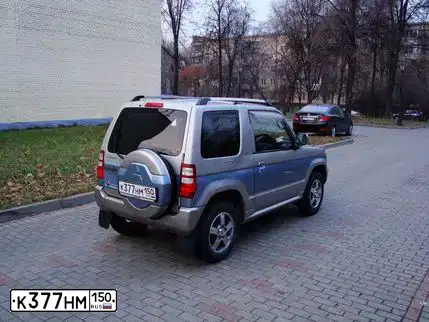 Фото автомобиля МИЦУБИСИ ПАДЖЕРО МИНИ МИЦУБИСИ ПАДЖЕРО МИНИ, 2003 — госномер В412ТН799. Цвет: Серо-Голубой