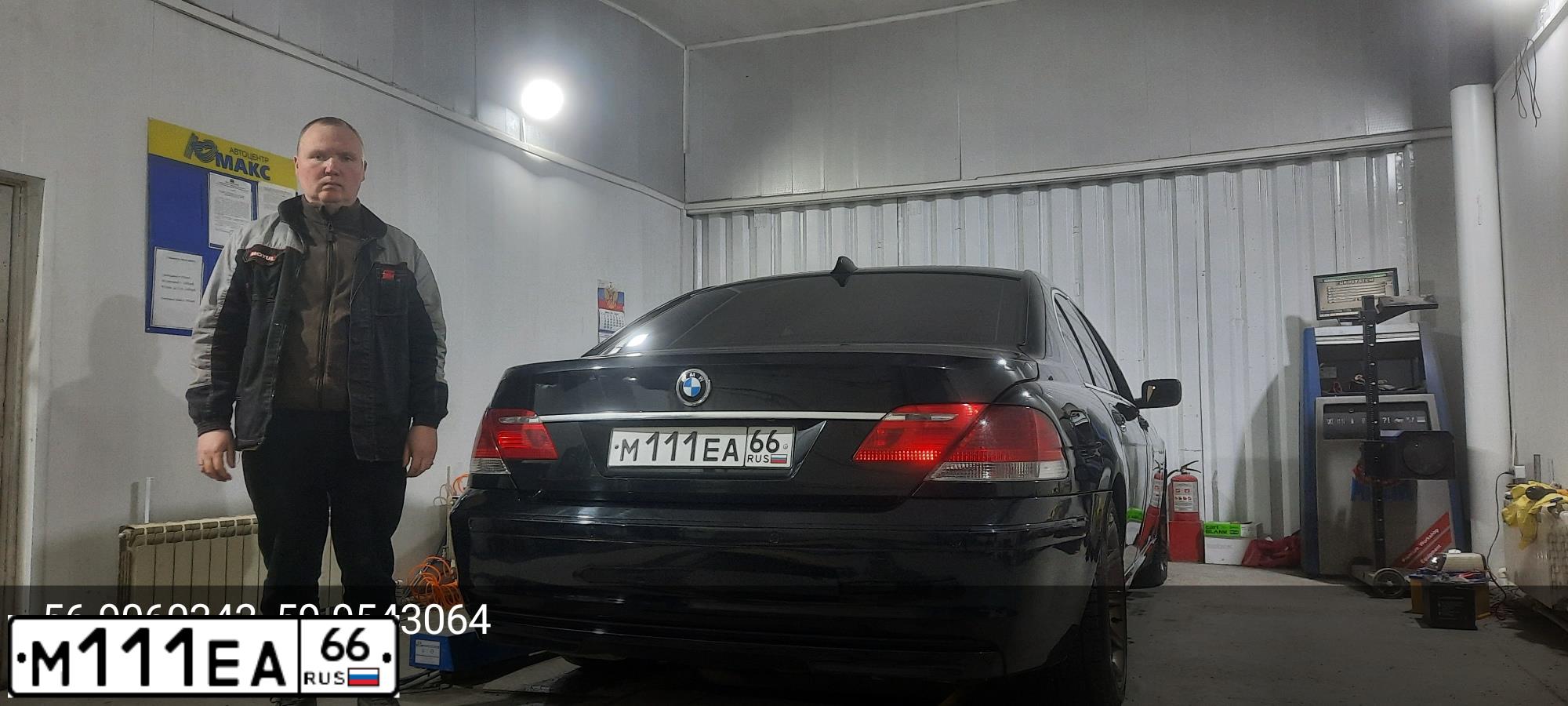Фото автомобиля BMW X5, 2009 — госномер Р285КВ196. Цвет: ЧЕРНЫЙ