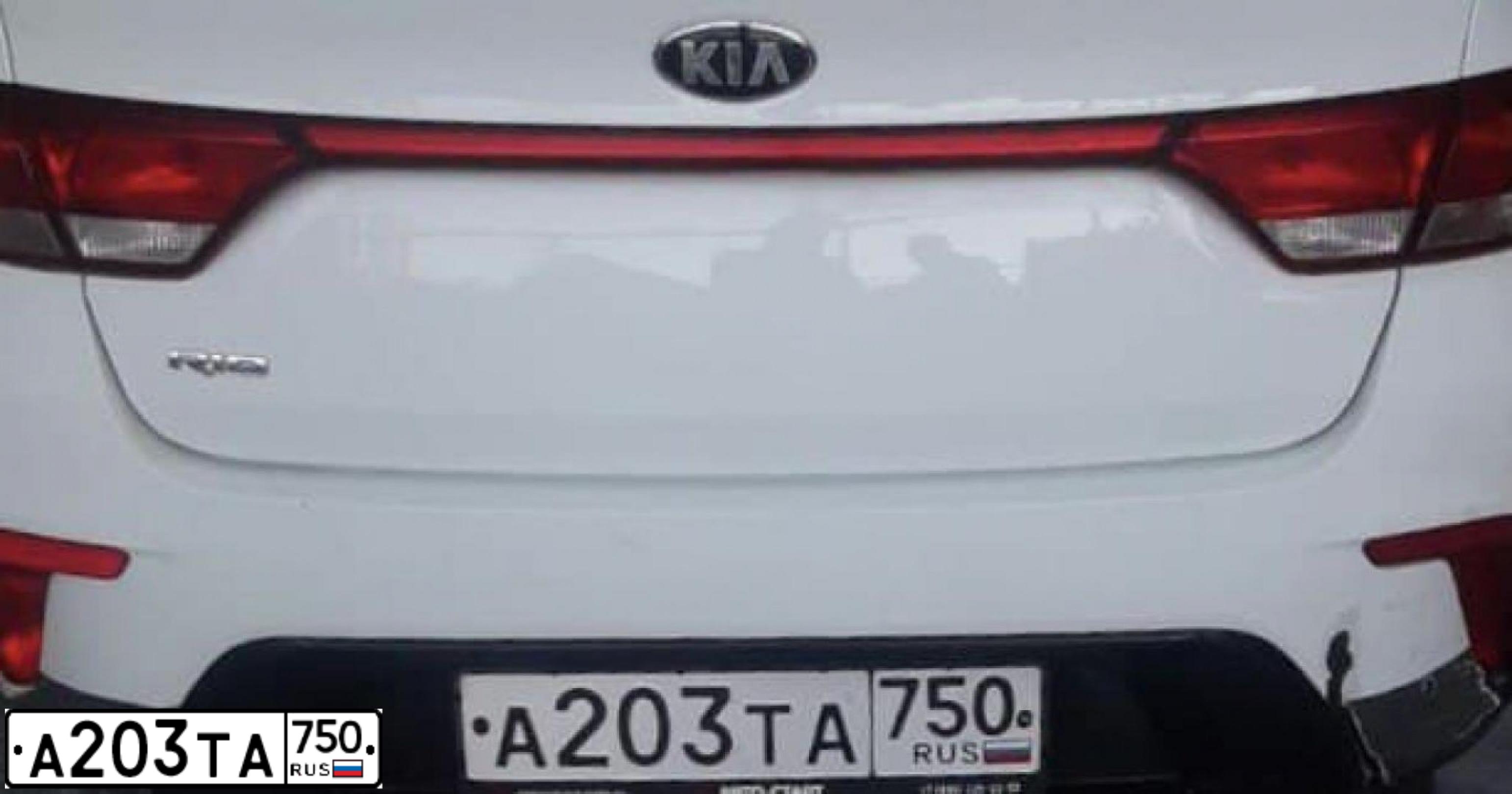 Фото автомобиля KIA RIO, 2019 — госномер А203ТА750. Цвет: БЕЛЫЙ ЖЕЛТЫЙ СЕРЫЙ