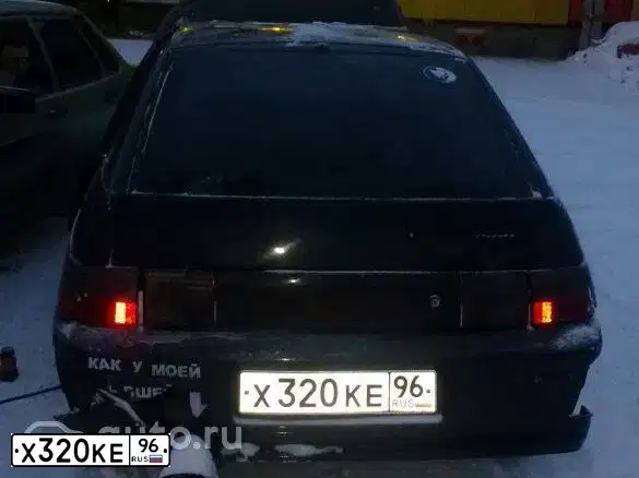 Фото автомобиля LADA 2112, 2003 — госномер Х320КЕ96. Цвет: ЧЕРНЫЙ