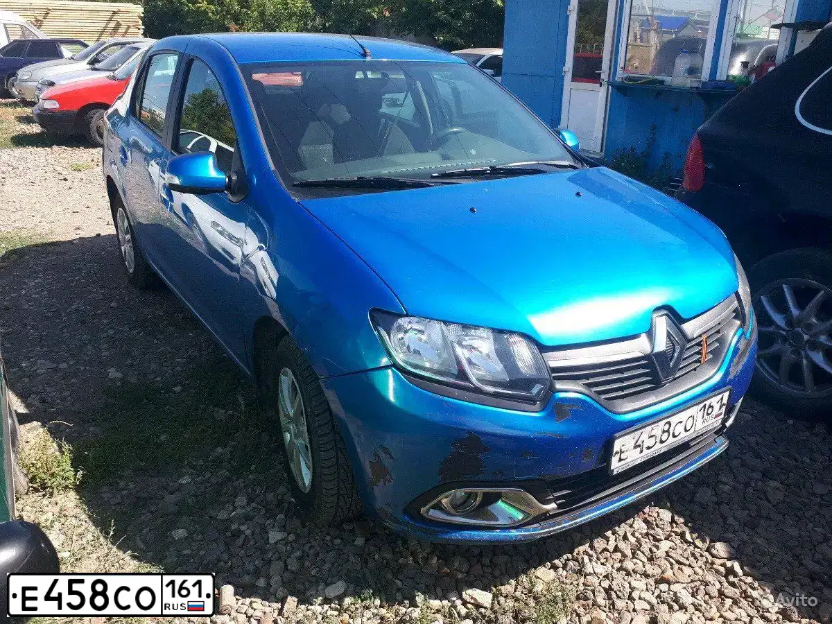 Фото автомобиля RENAULT LOGAN, 2014 — госномер Е031НО134. Цвет: СВЕТЛО-СИНИЙ