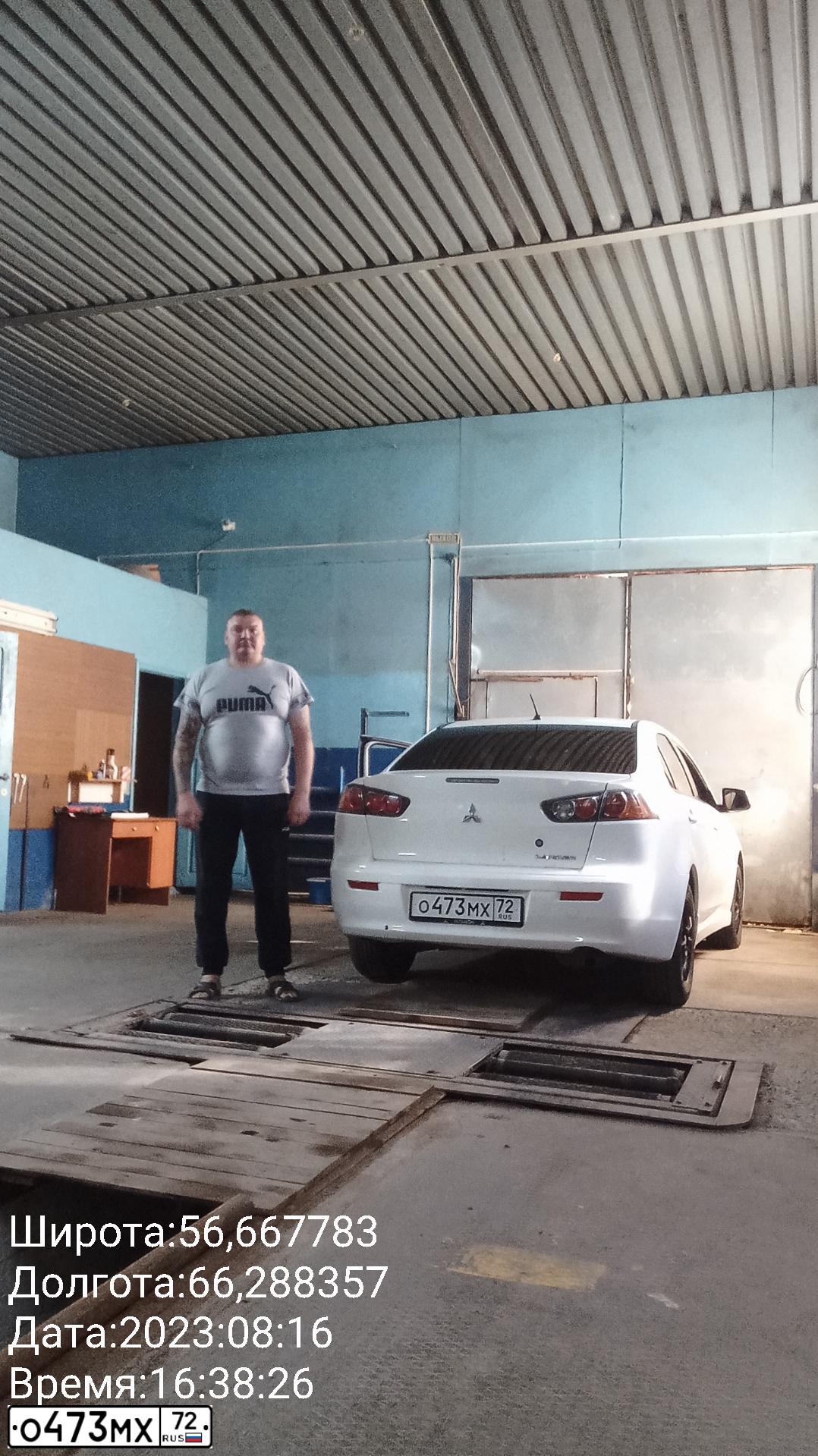 Фото автомобиля MITSUBISHI LANCER, 2012 — госномер О473МХ72. Цвет: Белый