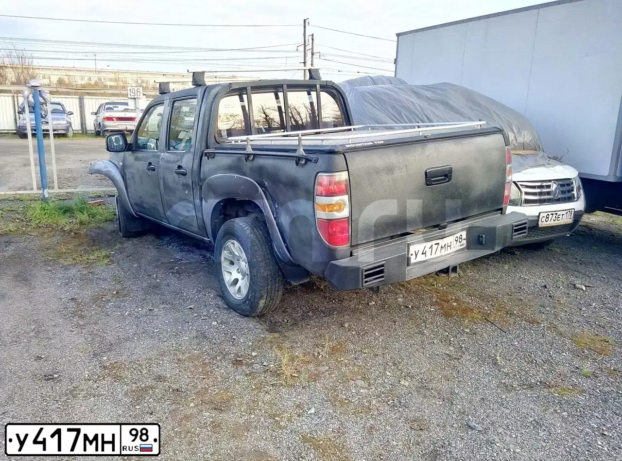 Фото автомобиля MAZDA BT-50, 2007 — госномер Р614ЕО11. Цвет: ЧЕРНЫЙ