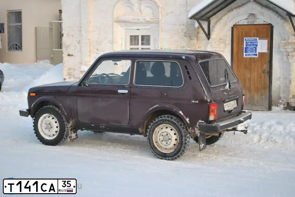 Фото автомобиля LADA 2121 NIVA, 2006 — госномер Р164МТ68. Цвет: ТЕМНО-ВИШНЕВЫЙ